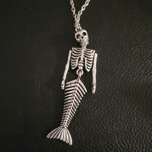Gothic mermaid skeleton earrings with moving arms & tail